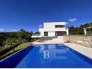 Spacious modern style house with sea views for sale in the prestigious urbanization of Can Quirze, Mataró.